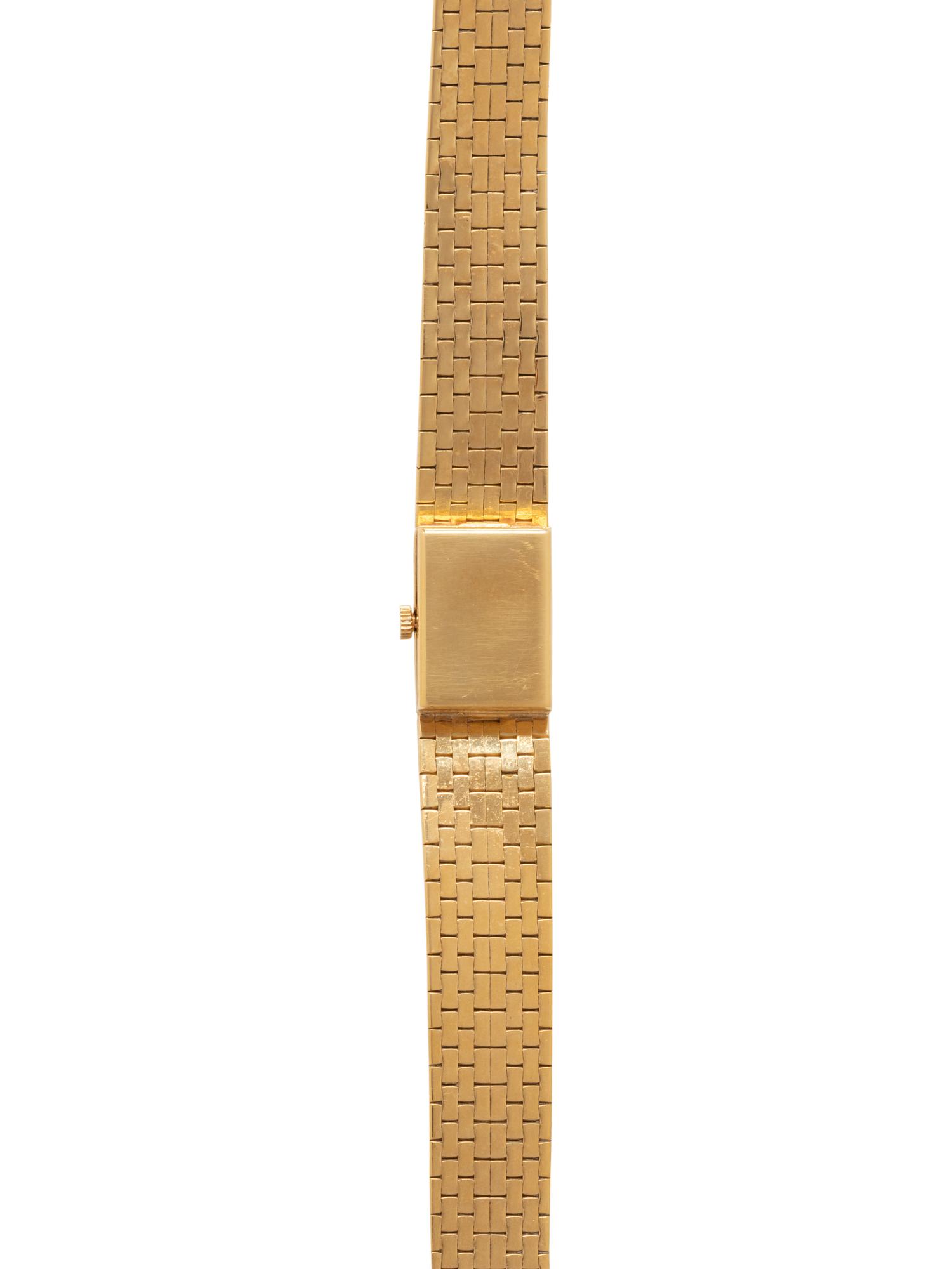 GÜBELIN, 18K YELLOW GOLD WATCH
