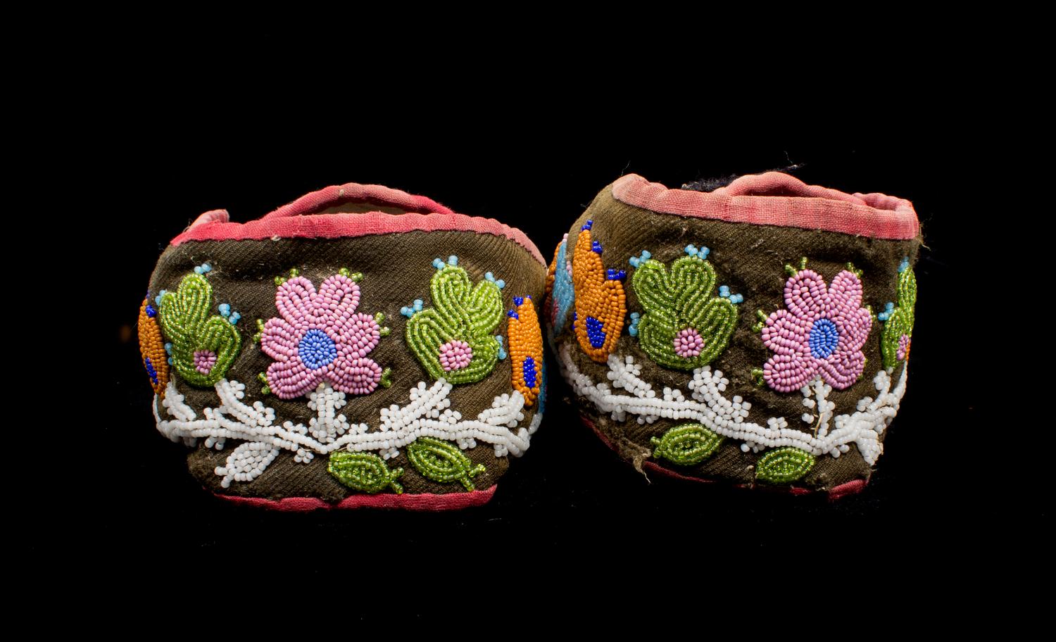 Five Pairs of Great Lakes Region Beaded Moccasins Length of largest 11 inches.