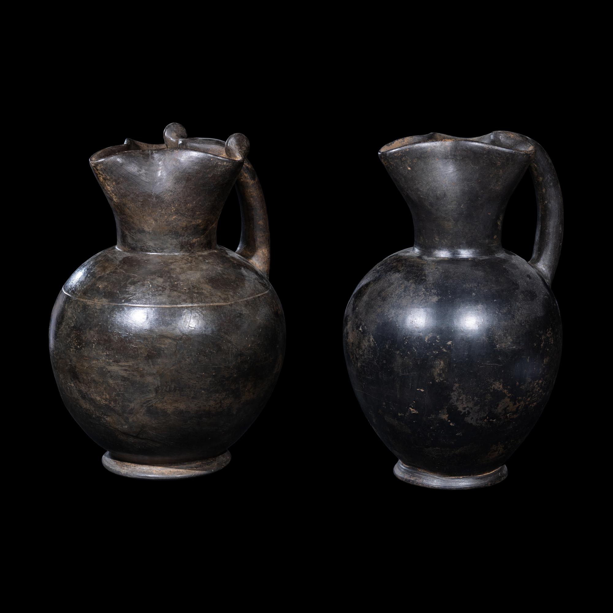 Two Etruscan Bucchero Oinochoai