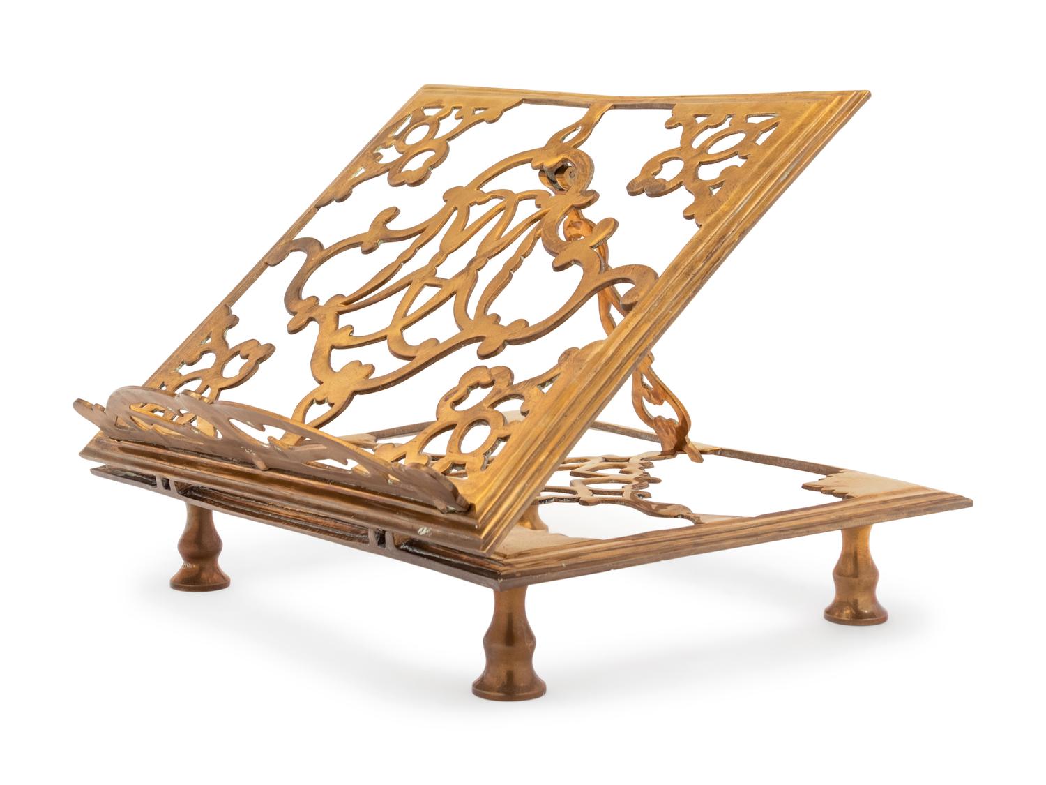 A Continental Brass Book Stand