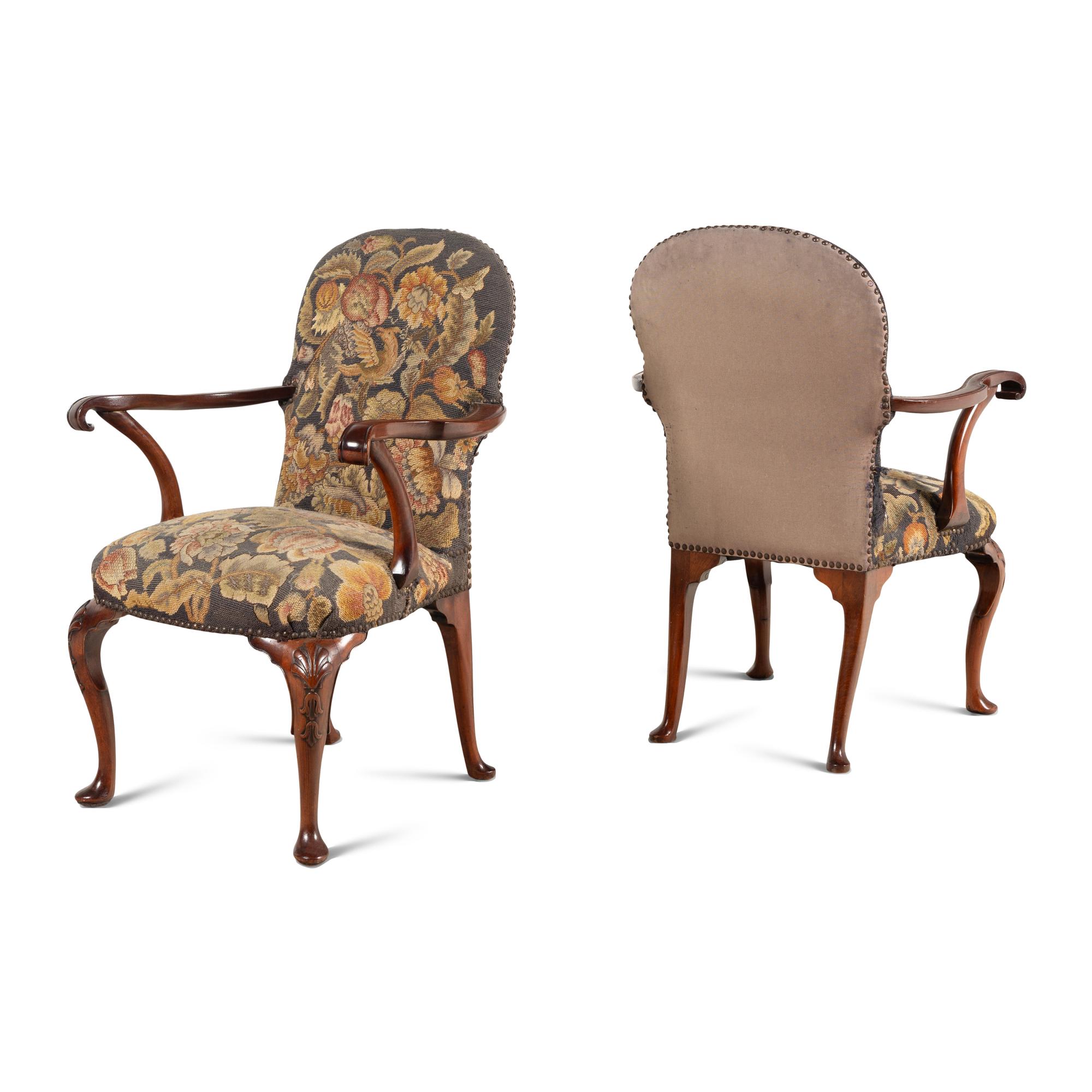A Pair of George I Style Carved Mahogany and Needlework Upholstered Armchairs