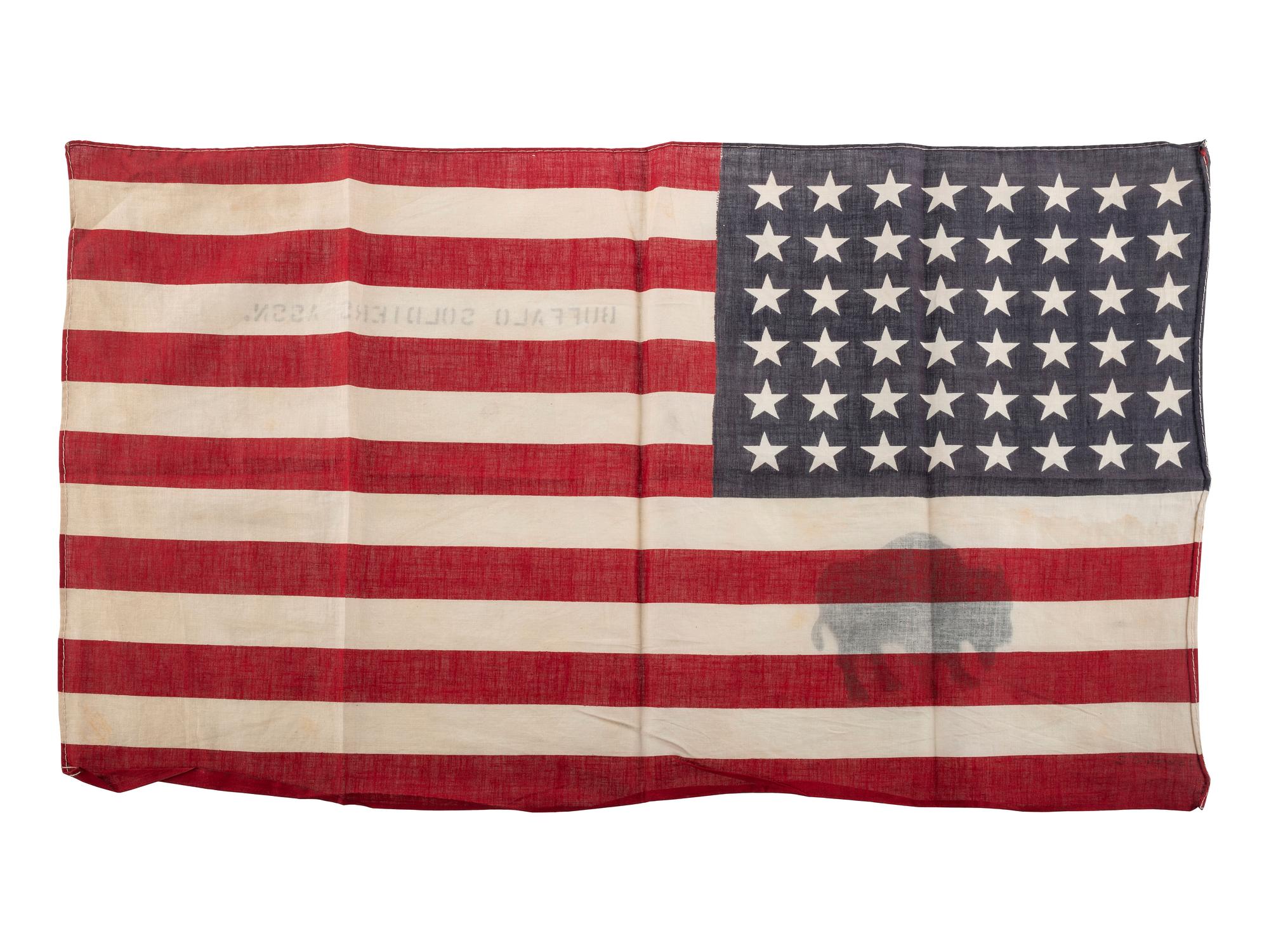 [BUFFALO SOLDIERS] -- [SPANISH AMERICAN WAR]. Sergeant Major George D. Powell, Co. C, 24th US Infantry, archive incl. Buffalo Soldiers' parade flag, identified wooden box and personal items.