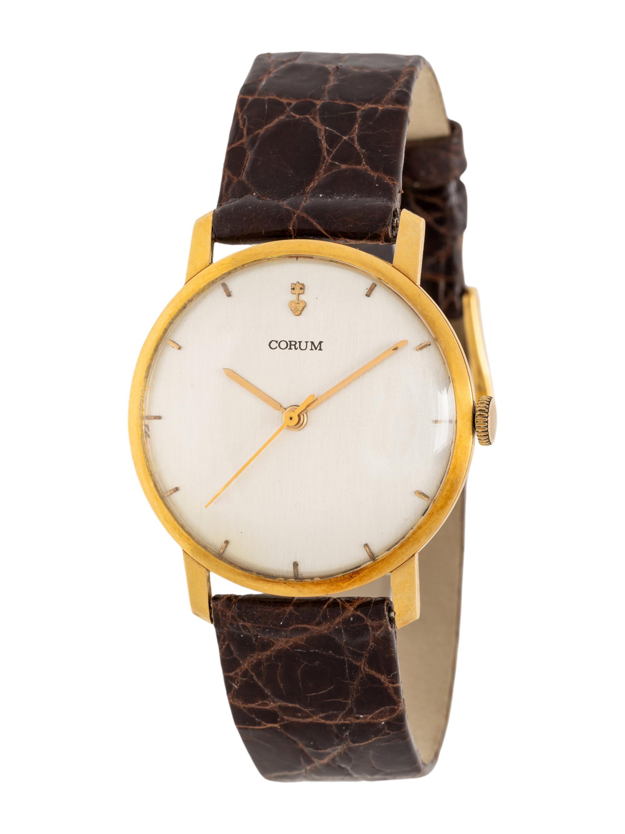 CORUM, REF. 5595 4 18K YELLOW GOLD WATCH