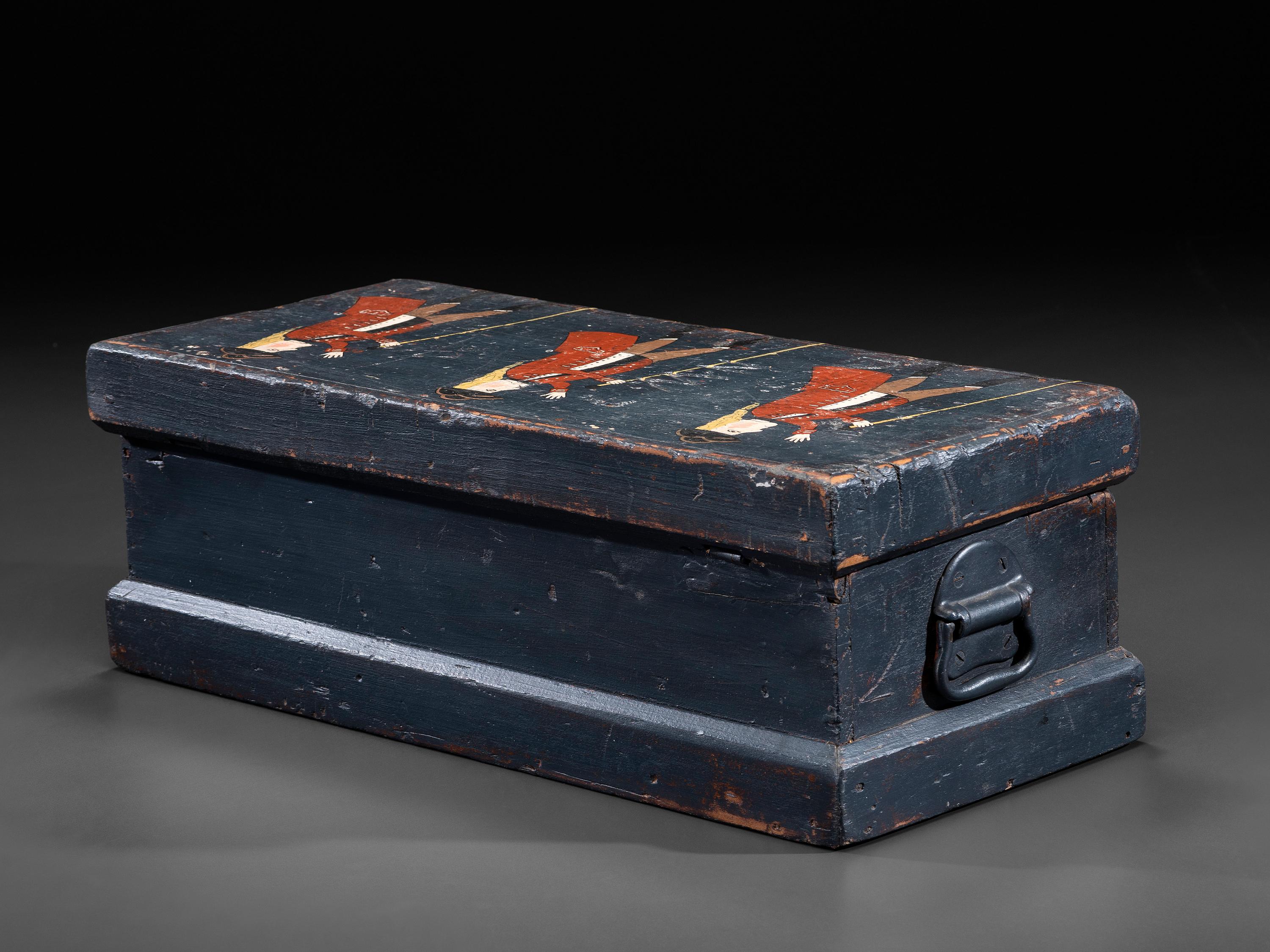 A Folk Art Carved and Painted Box