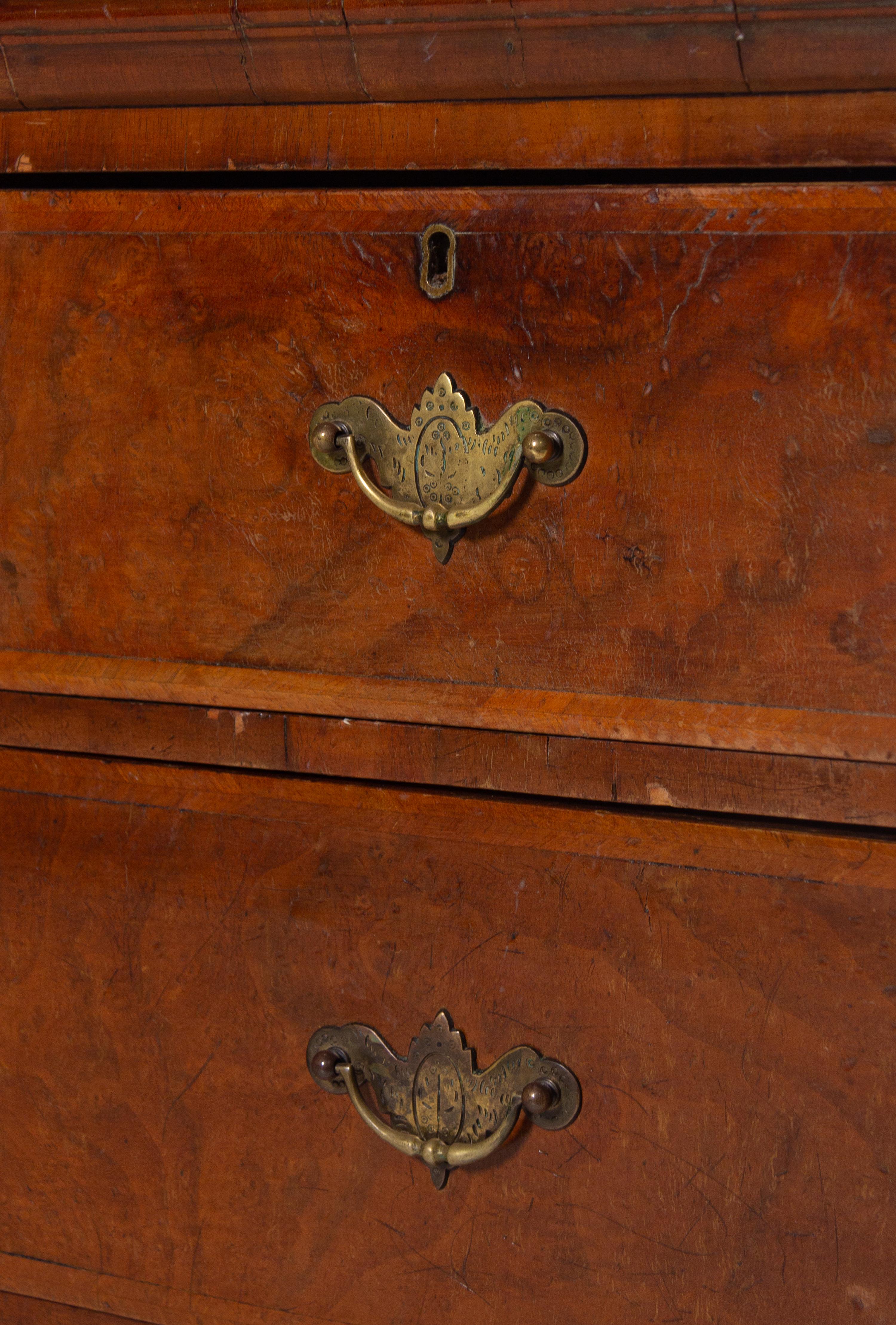 A George II Burl Walnut Chest of Drawers