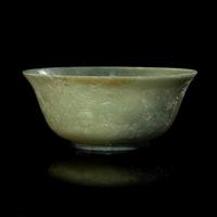 A Chinese Celadon Jade 'Dragon' Bowl, 20th Century 近代 青玉刻龍紋碗