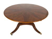 A Pair of Regency Style Mahogany Circular Dinner Tables