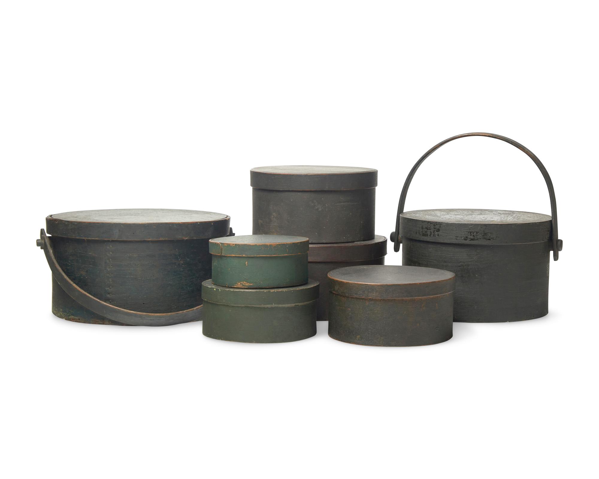 Seven Green-Painted Round Pantry Boxes