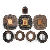 [EARLY PHOTOGRAPHY - CASES AND FRAMES]. A group of 8 cast iron wall frames, including: