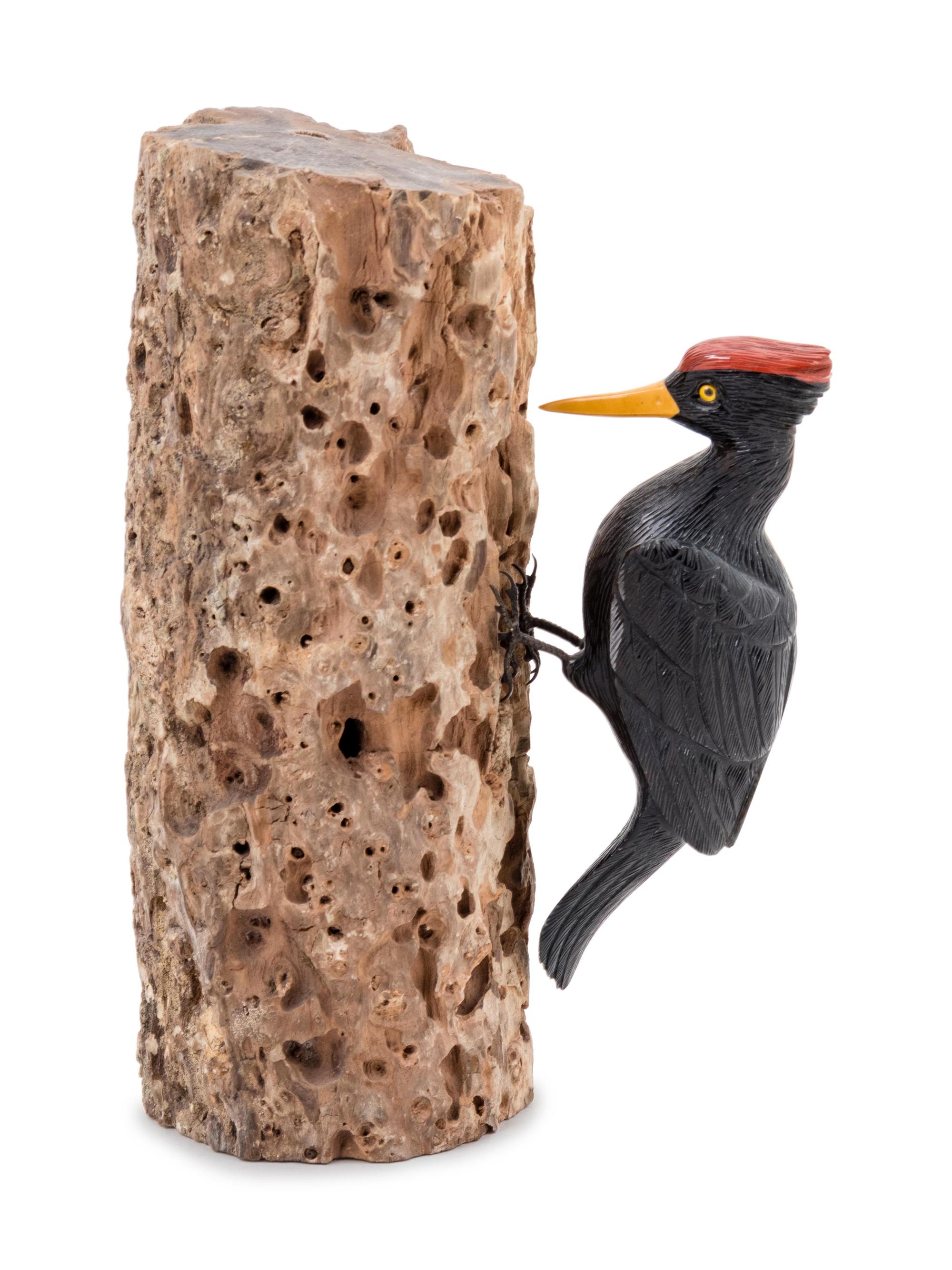 A Carved Tiger Eye Figure of a Woodpecker