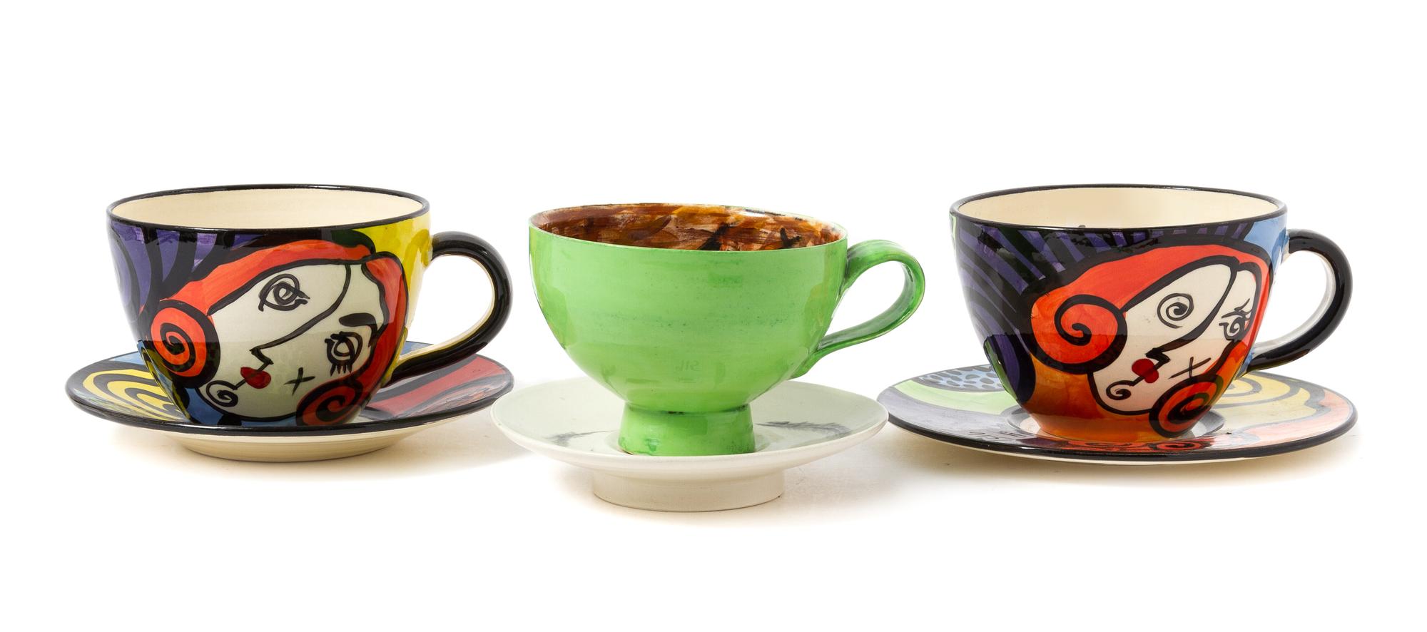Three Contemporary Painted Ceramic Tea Cups and Saucers Diameter of each 5 3/4 inches.