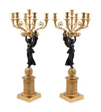 A Pair of Empire Style Gilt and Patinated Metal Six-Light Figural Candelabra