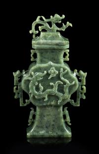 A Spinach Jade 'Chilong' Covered Vase Height 12 inches. — EARLY 20TH CENTURY