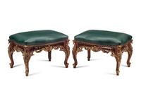 A Pair of Régence Style Painted and Parcel Gilt Stools