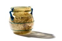 A Roman Yellow Glass Jar with Blue Spiral Trail