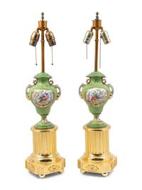A Pair of Sèvres Style Porcelain and Giltwood Urns Mounted as Lamps