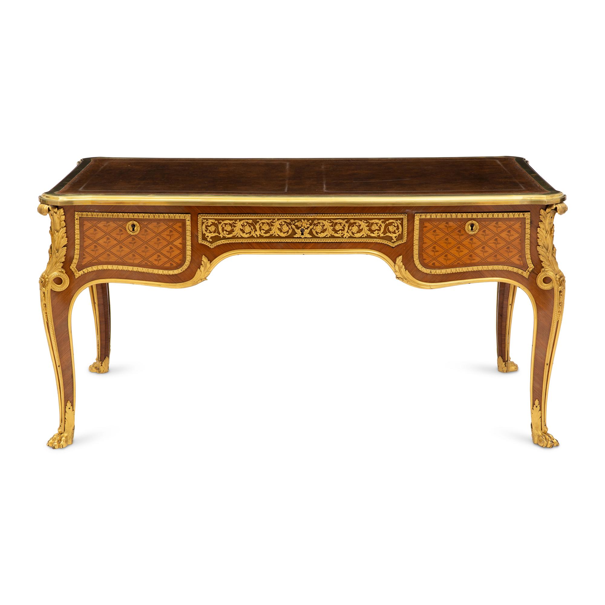 A Louis XVI Style Marquetry and Gilt Bronze Mounted Bureau Plat
