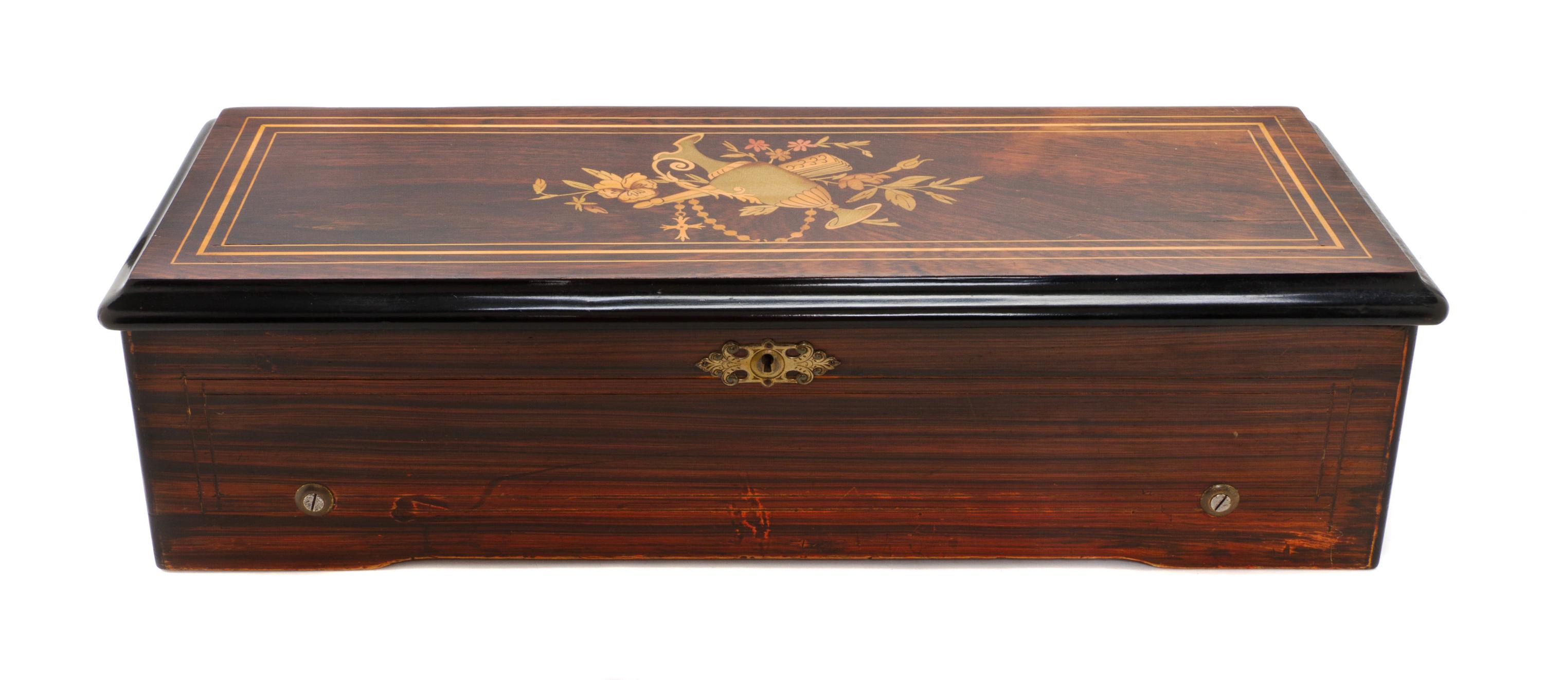 A Swiss Marquetry Cylinder Music Box, Height 6 x width 22 1/2 x depth 9 inches.