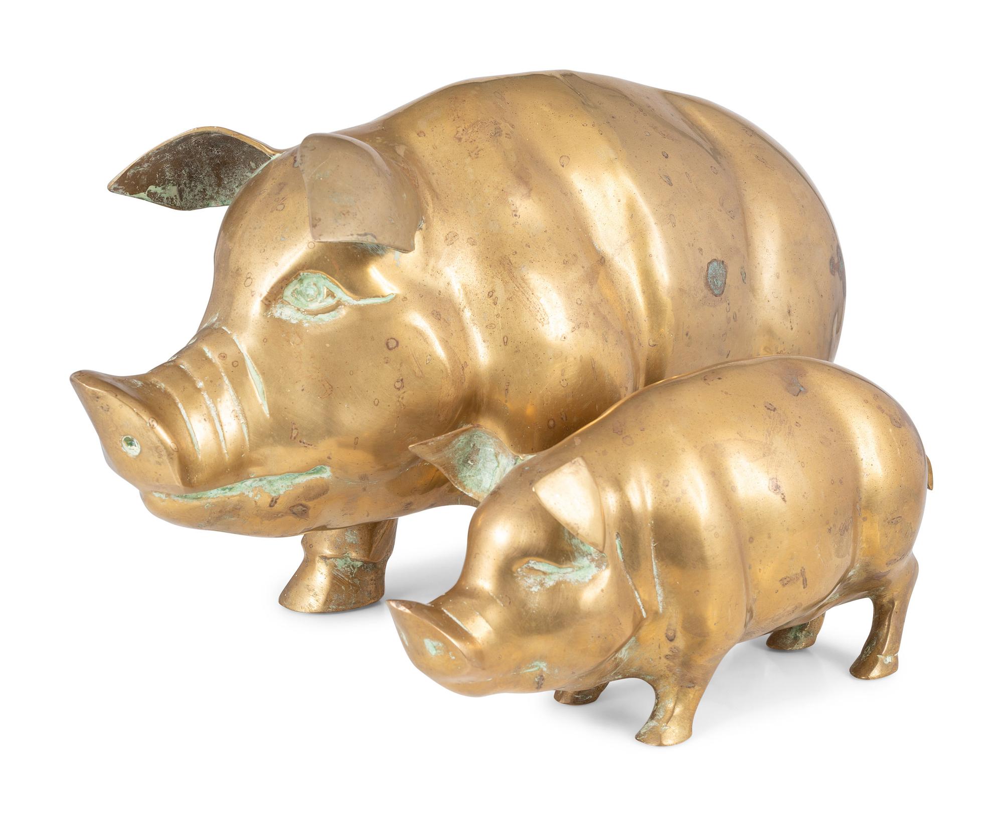 Two Brass Pig Sculptures