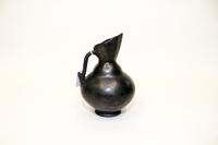A Blackware Pottery Ewer, Dona Rosa, Oaxaca, Mexico Height 7 1/2 inches.