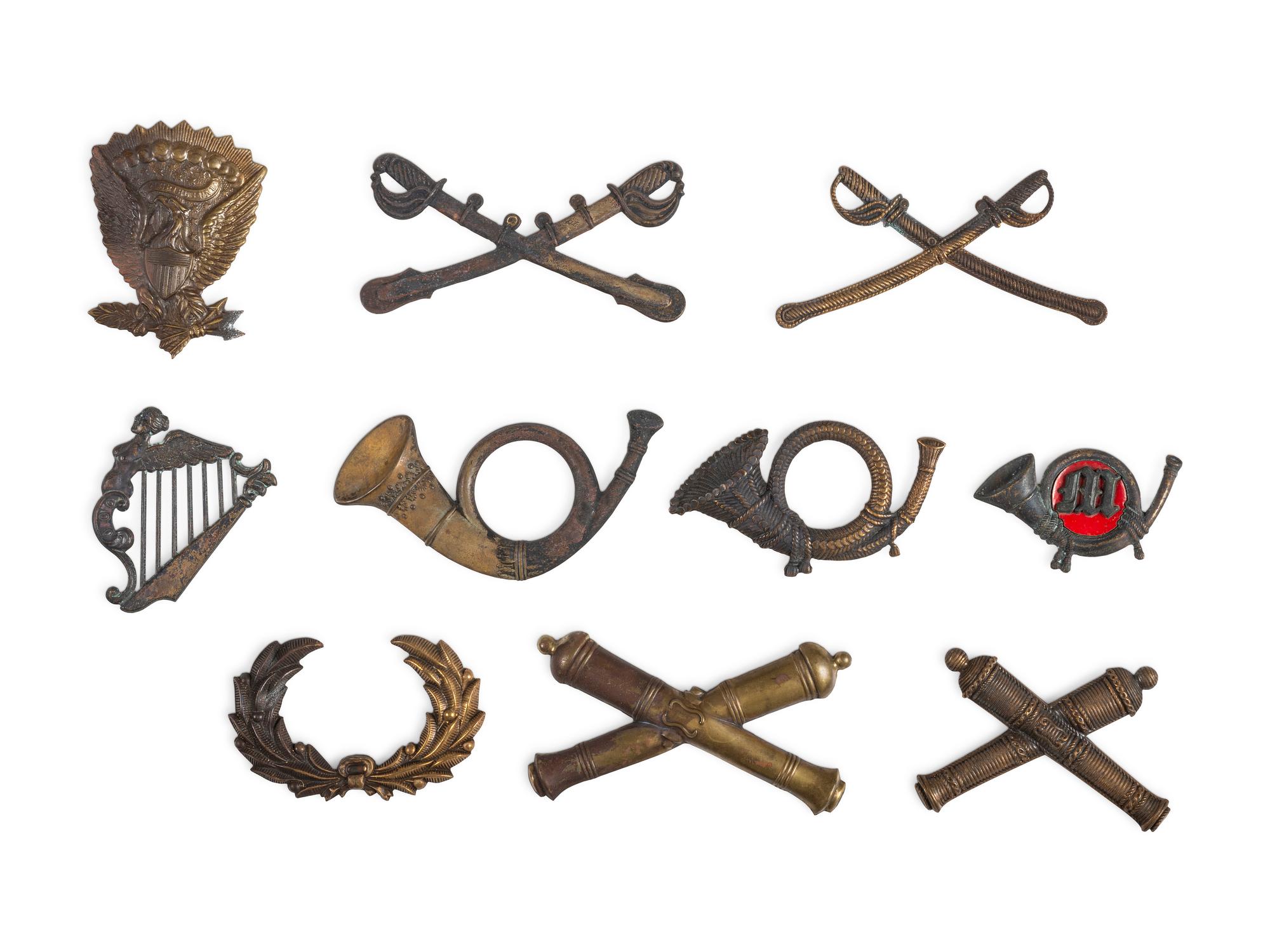 A group of 10 reproduction Civil War insignia. [Ca 1960s].