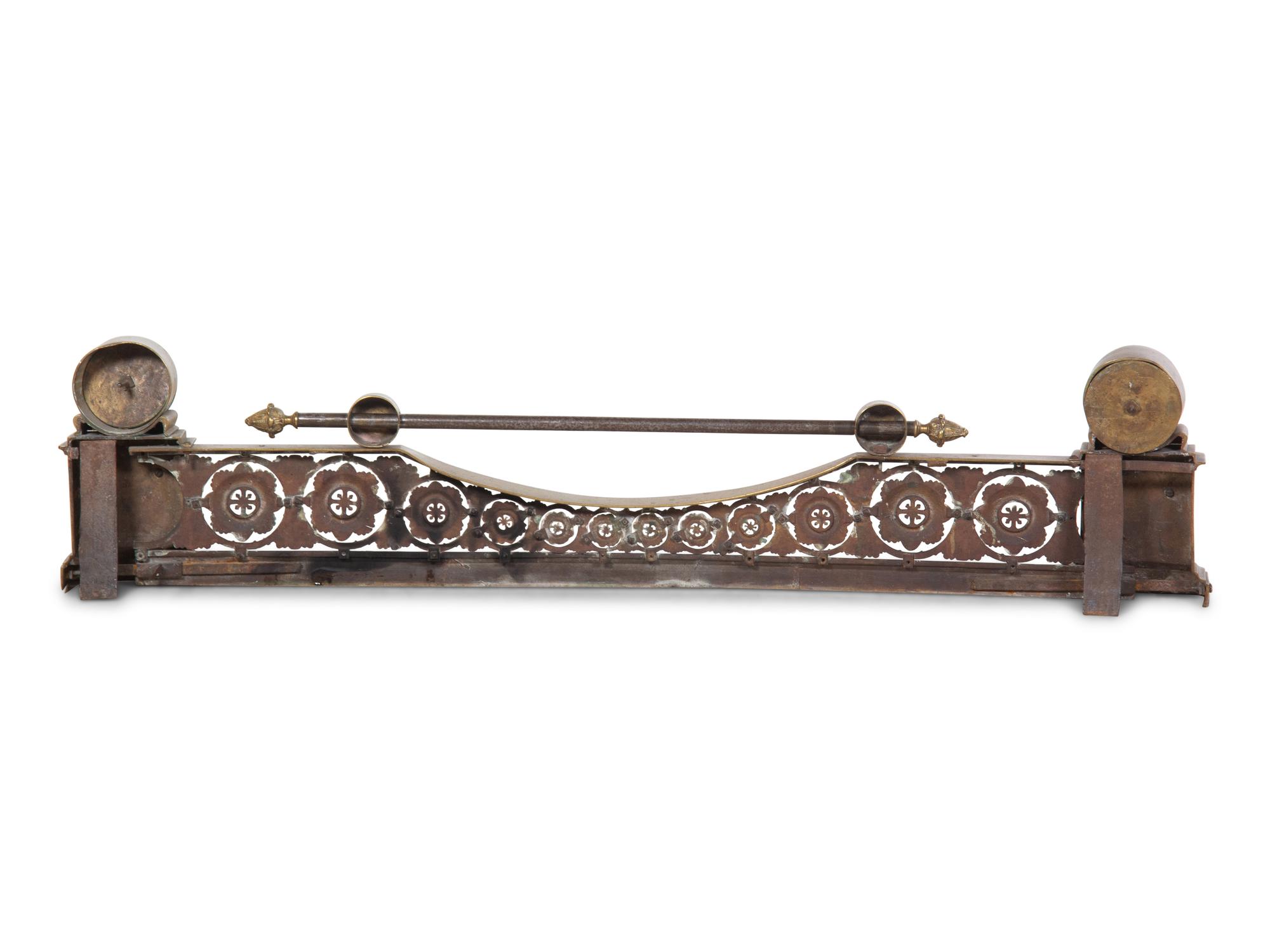 An Empire Gilt Bronze Fire Fender