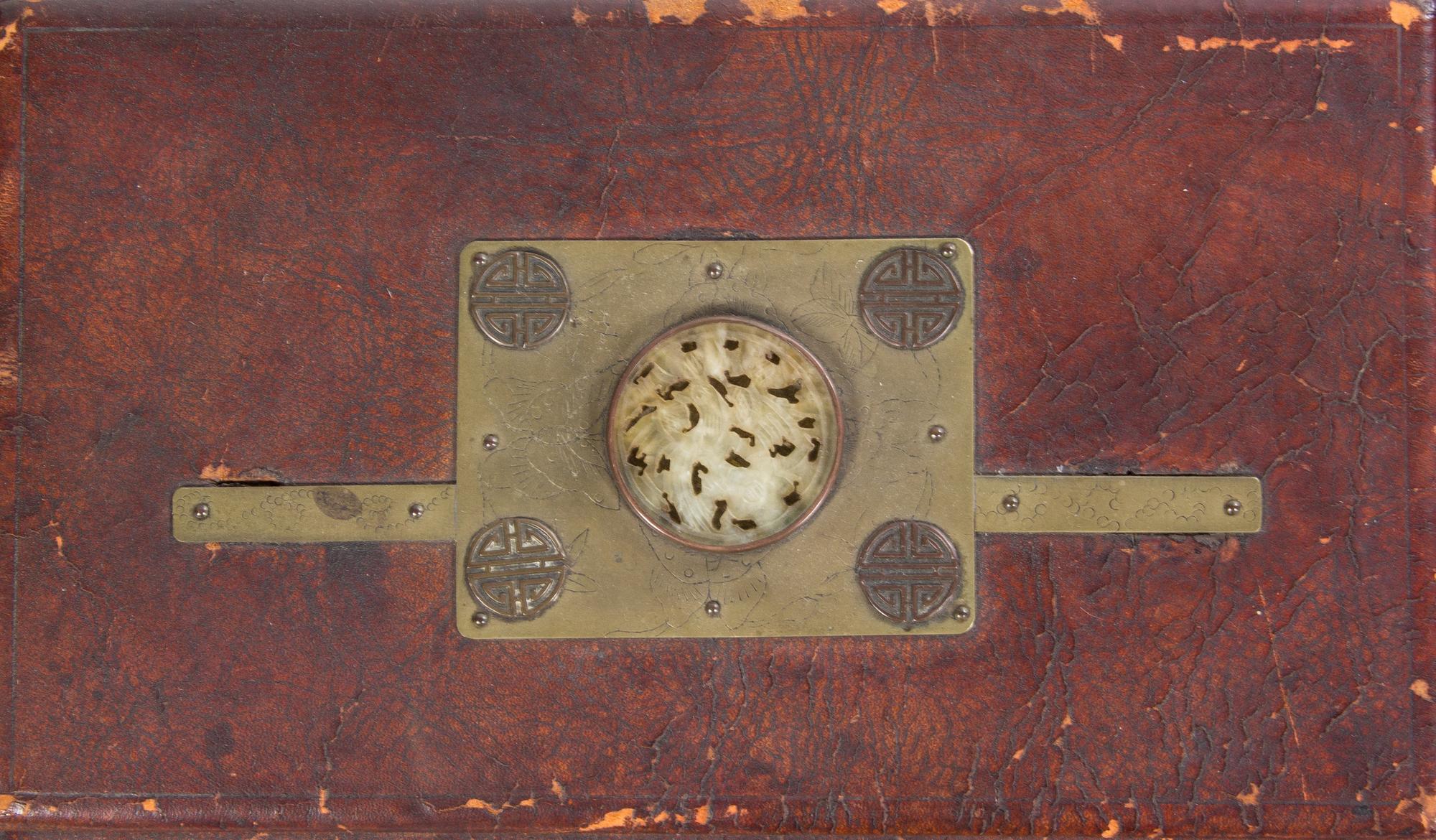 A Large Korean Leather and Porcelain-Inset Chest 18TH/19TH CENTURY Height 14 1/4 x width 29 1/4 x depth 11 1/4 inches. — 18TH/19TH CENTURY