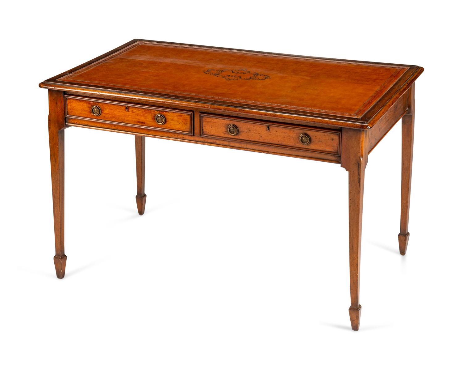 An Edwardian Mahogany Writing Table — CIRCA 1900