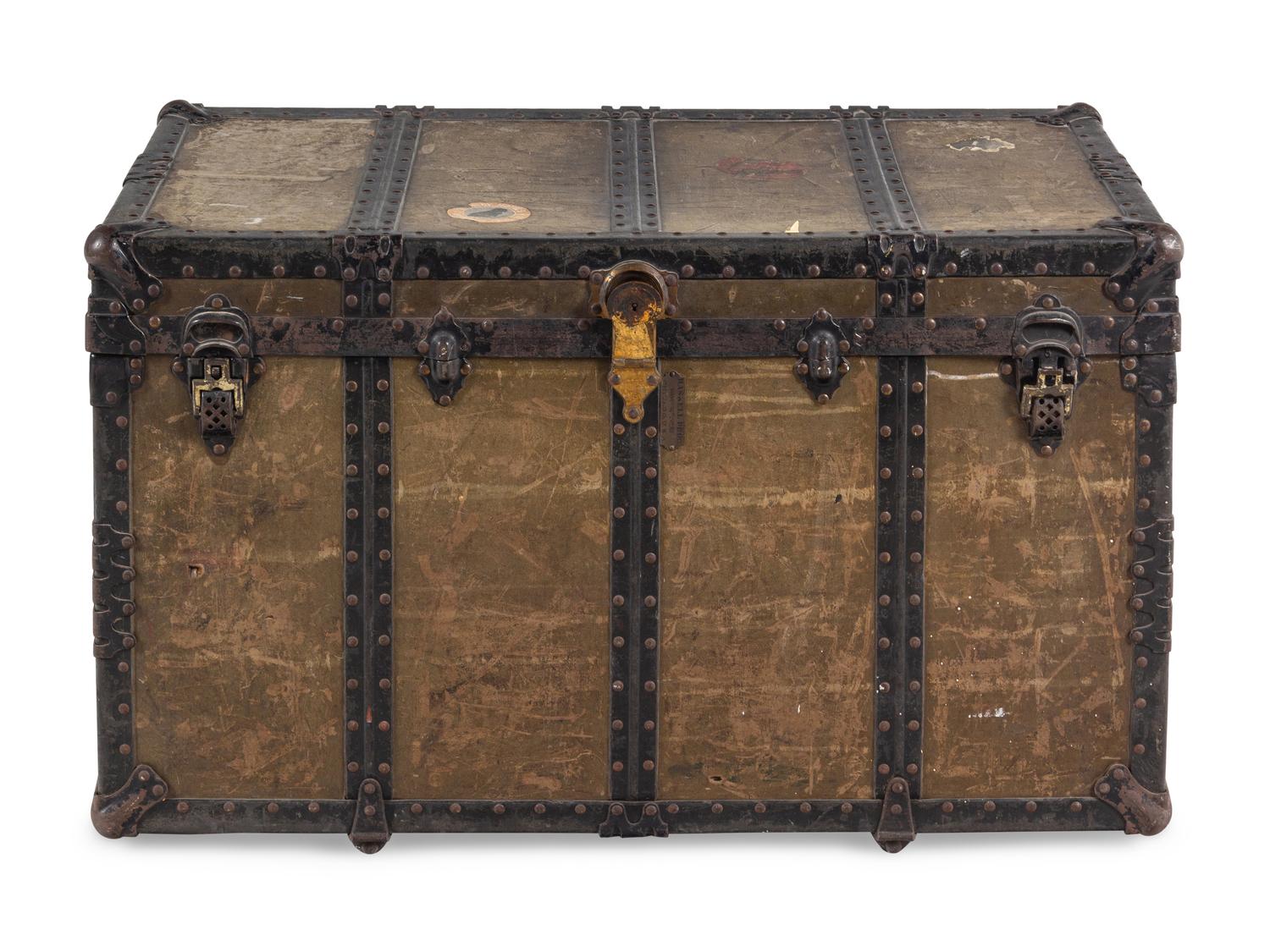 A Leather and Iron Steamer Trunk