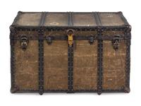 A Leather and Iron Steamer Trunk