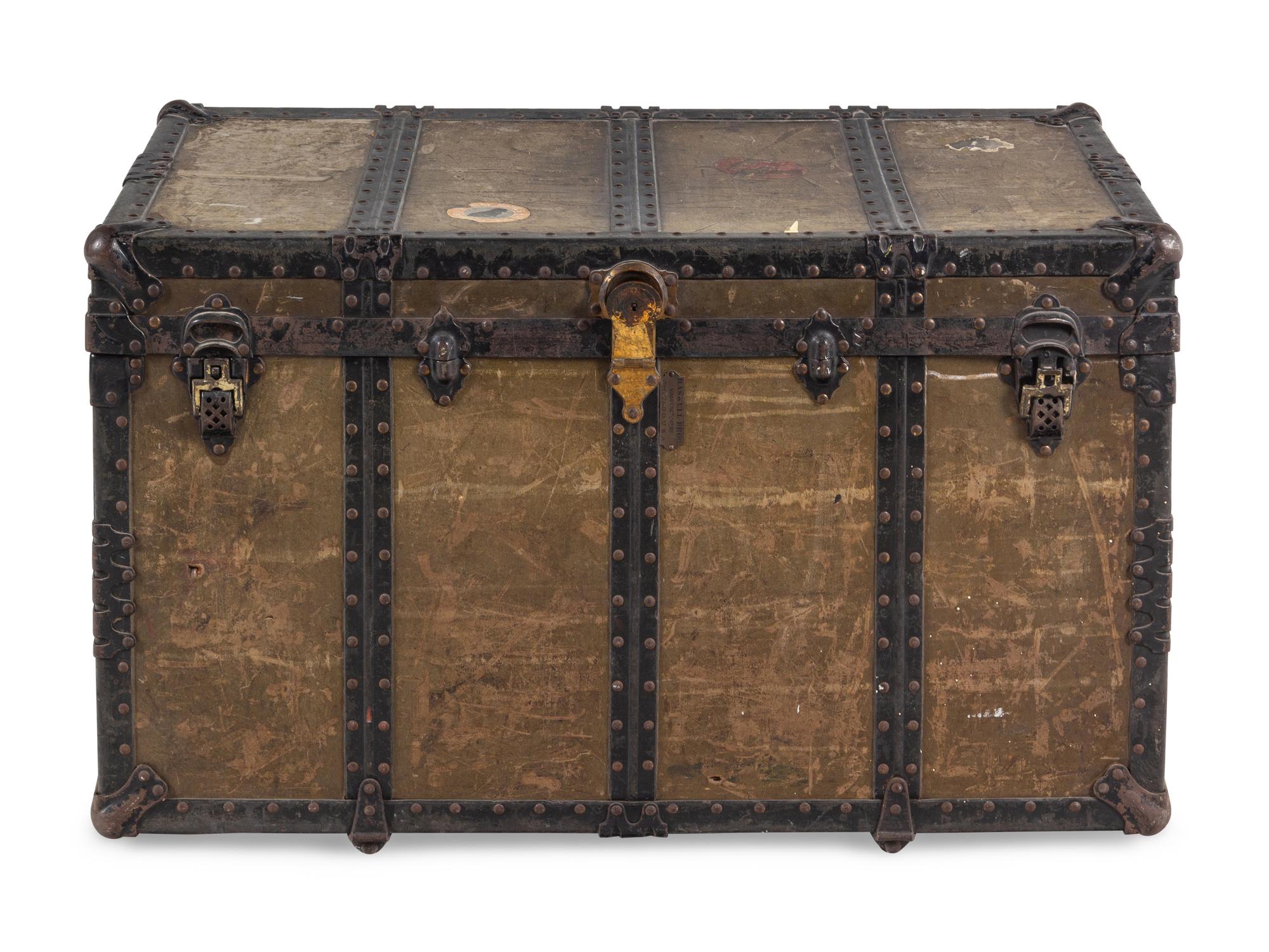 A Leather and Iron Steamer Trunk