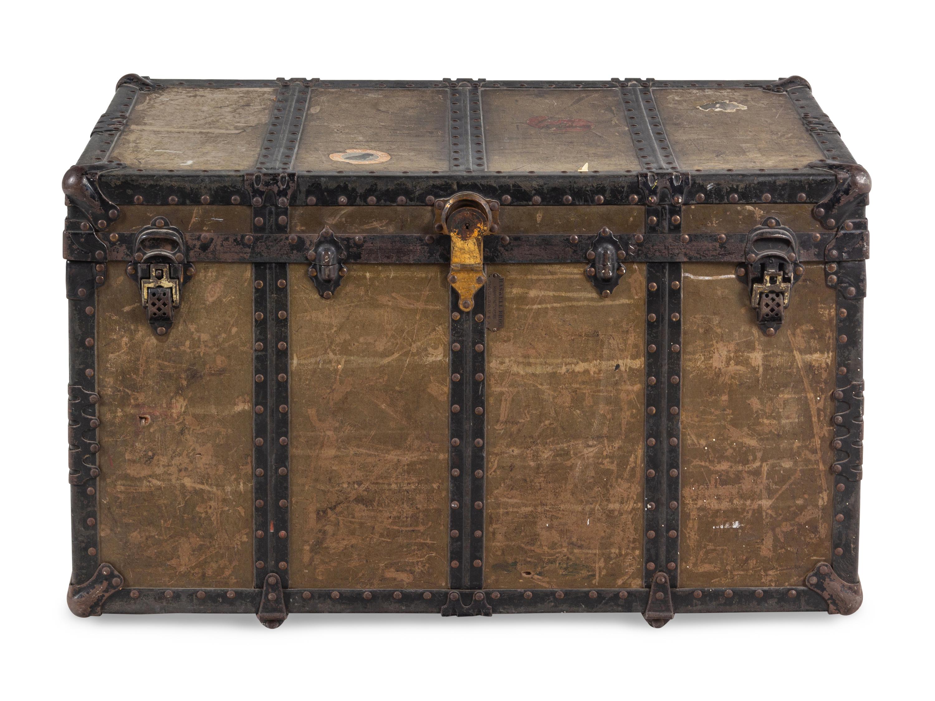 A Leather and Iron Steamer Trunk