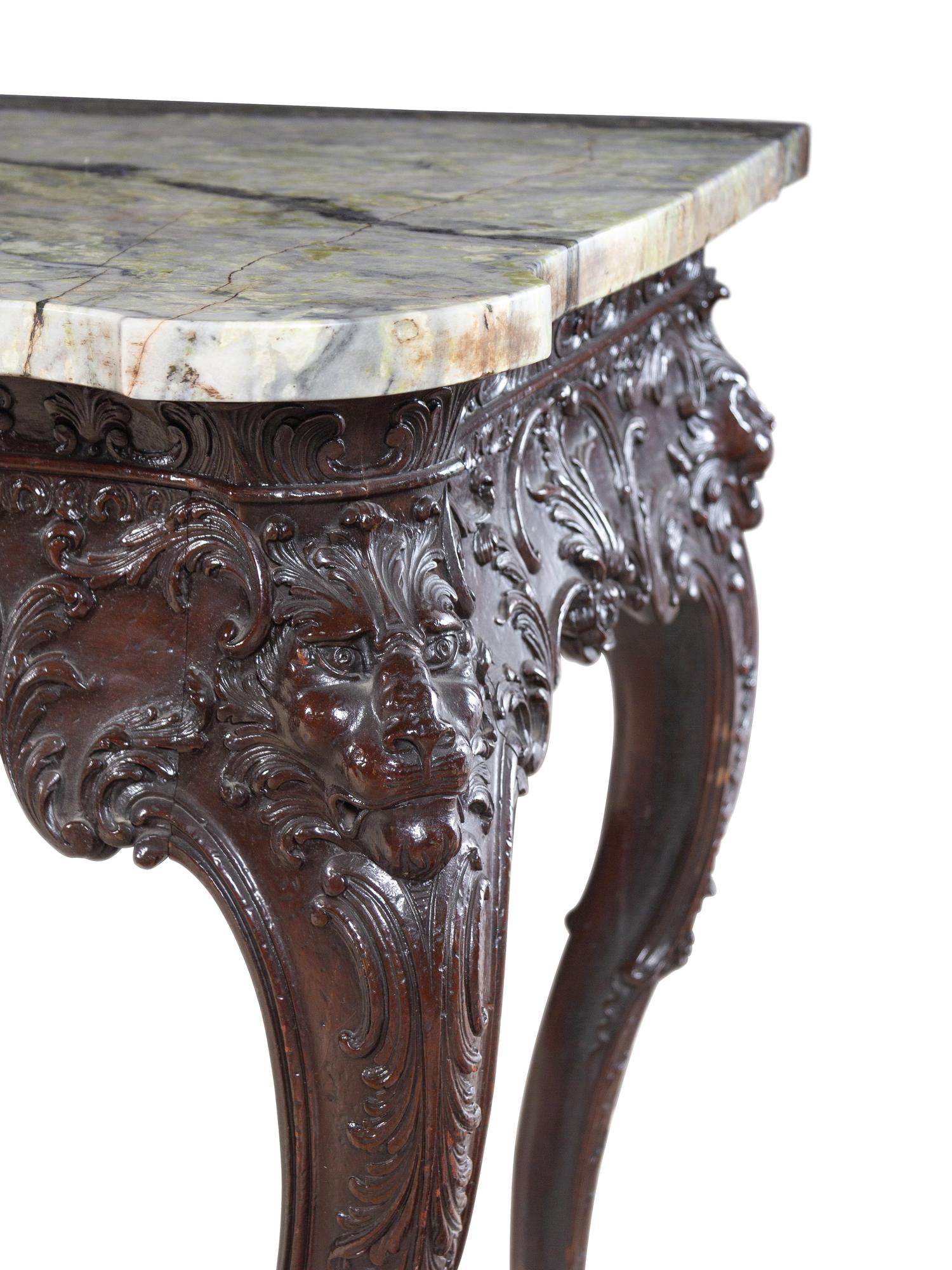 A Pair of George II Style Carved Walnut Marble-Top Pier Tables