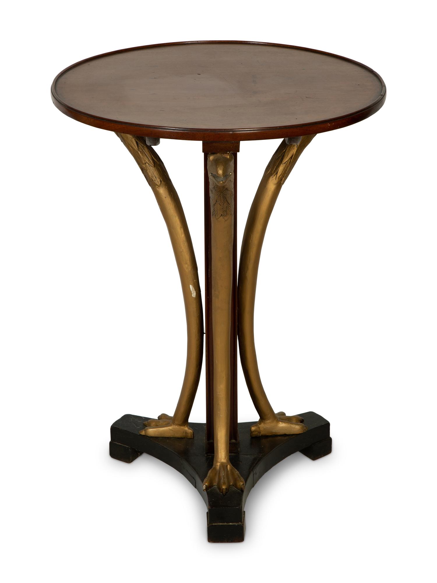 An Empire Style Parcel Gilt Mahogany Side Table