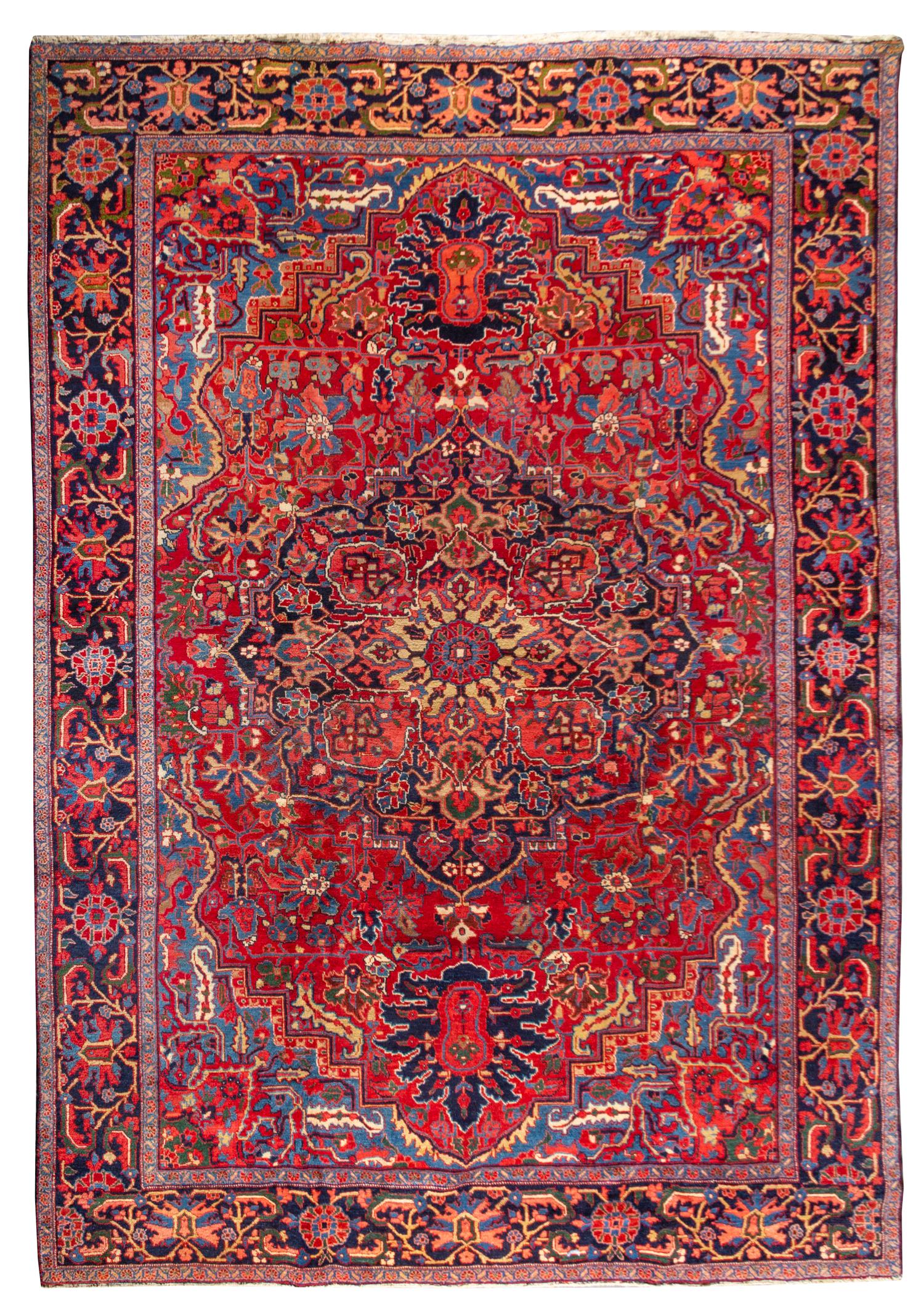 A Heriz Wool Rug 11 feet 1 inch x 8 feet 1 1/2 inches. — FIRST HALF 20TH CENTURY