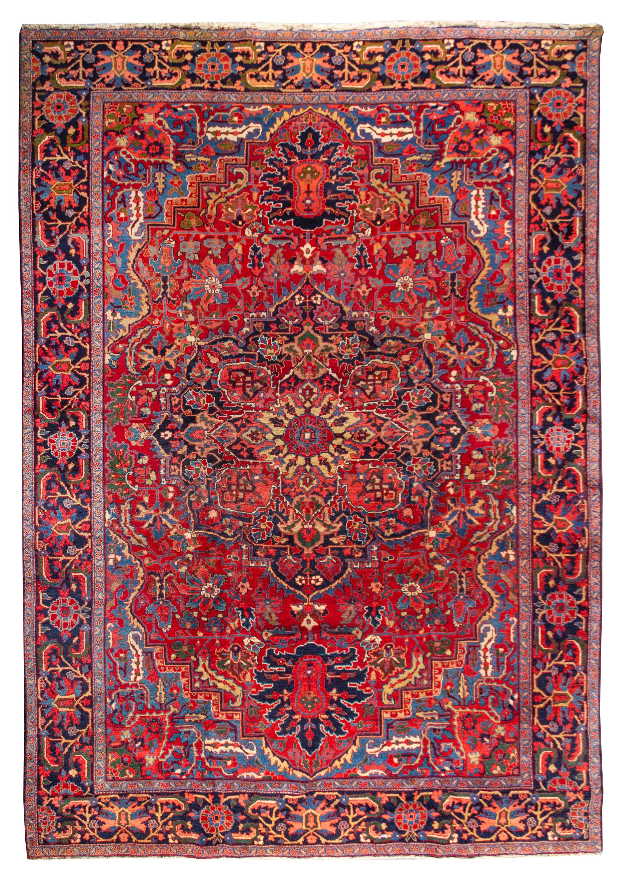A Heriz Wool Rug 11 feet 1 inch x 8 feet 1 1/2 inches. — FIRST HALF 20TH CENTURY