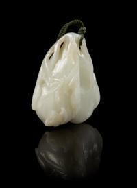 A Carved Jade Pendant Length 2 1/4 inches.
