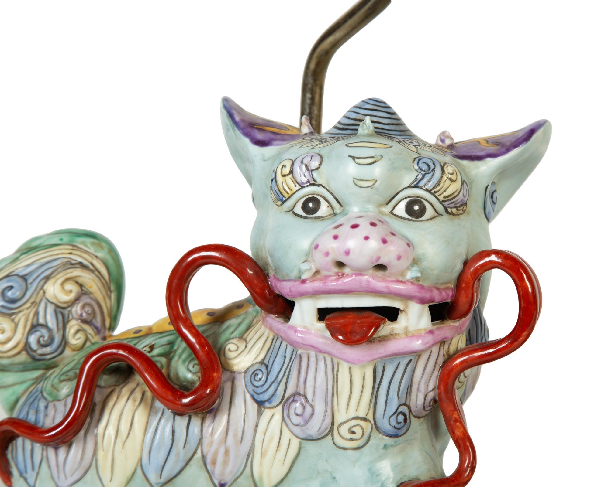 A Pair of Chinese Export Porcelain Buddhistic Lions Mounted as Lamps