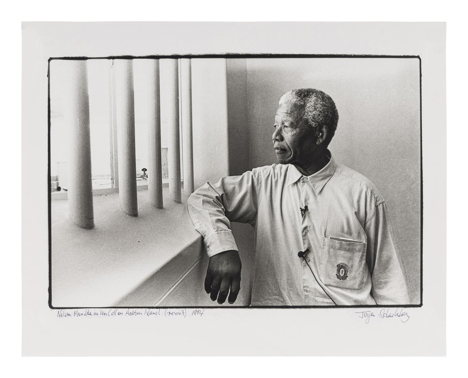 Jürgen Schadeberg (1931-2020) Nelson Mandela revisiting his cell on Robben Island, 1994
