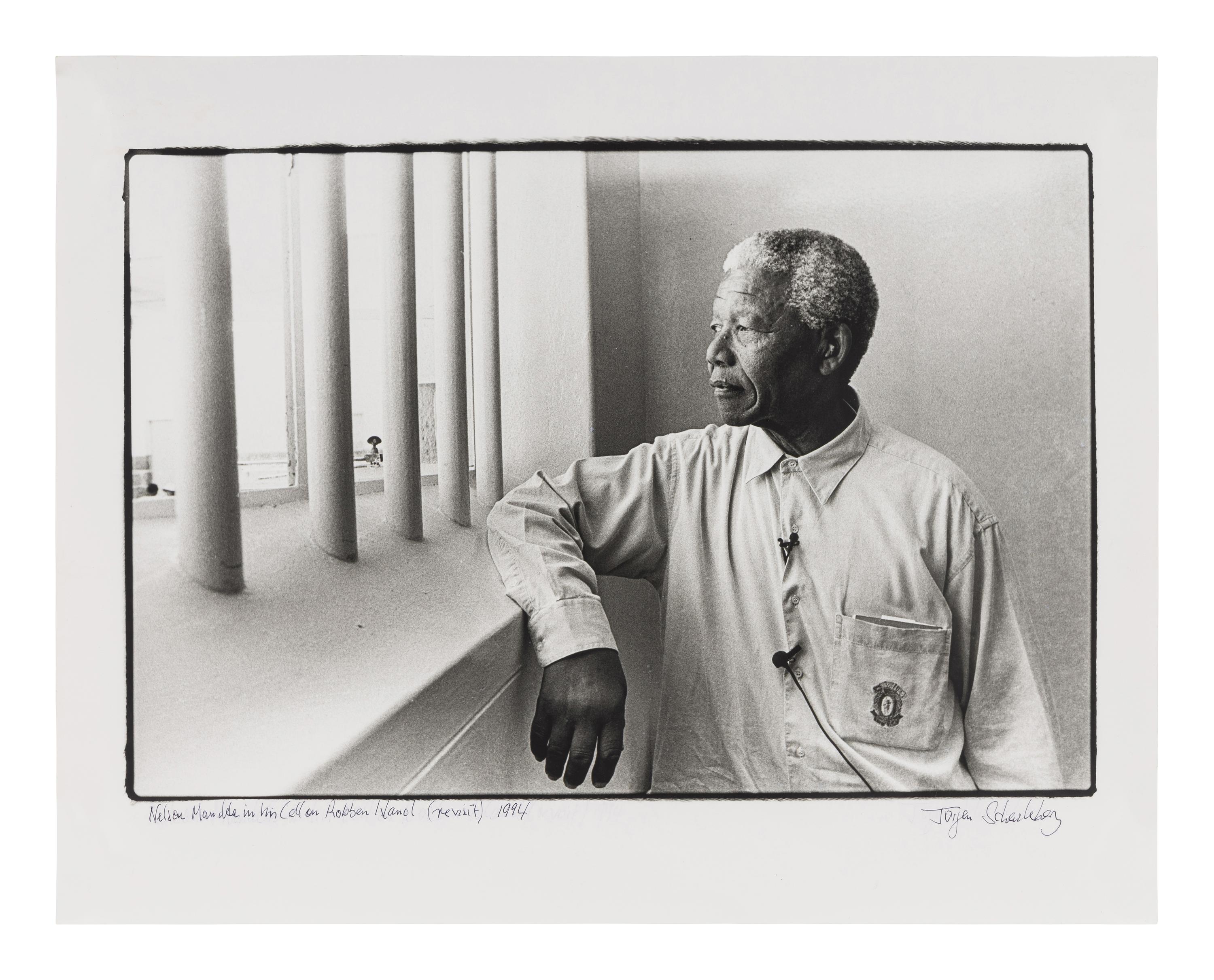 Jürgen Schadeberg (1931-2020) Nelson Mandela revisiting his cell on Robben Island, 1994
