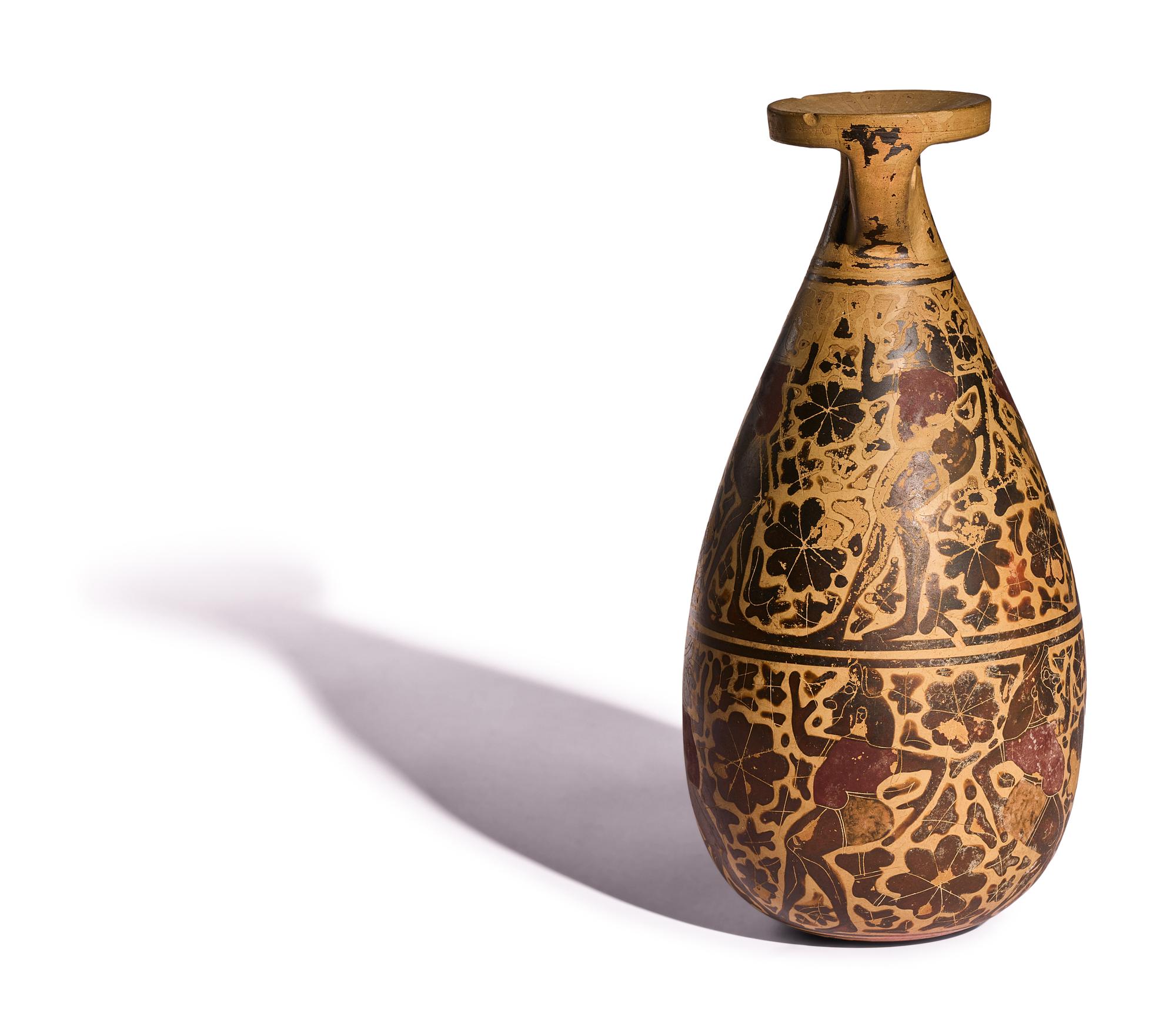 A Corinthian Black-Figured Alabastron with Padded Dancers