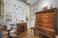 A Pair of George III Mahogany Alms Urns