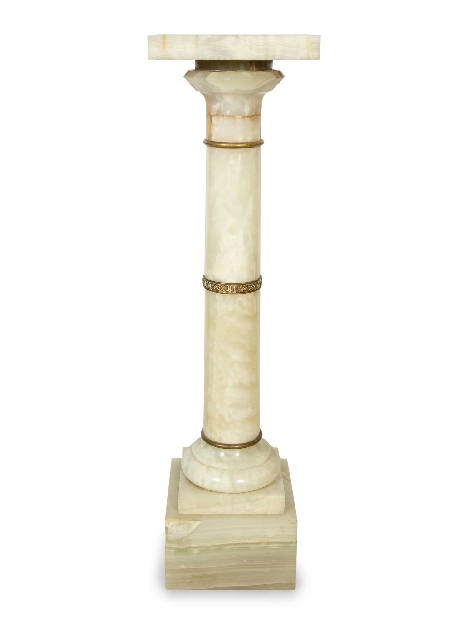 A Continental Gilt Bronze Mounted Onyx Pedestal