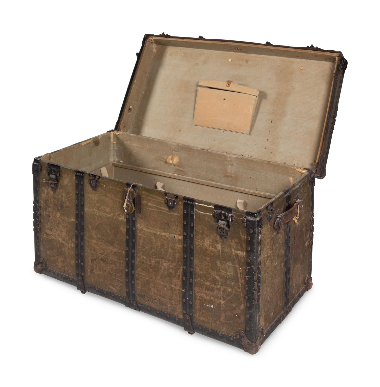 A Leather and Iron Steamer Trunk