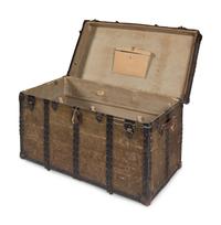 A Leather and Iron Steamer Trunk