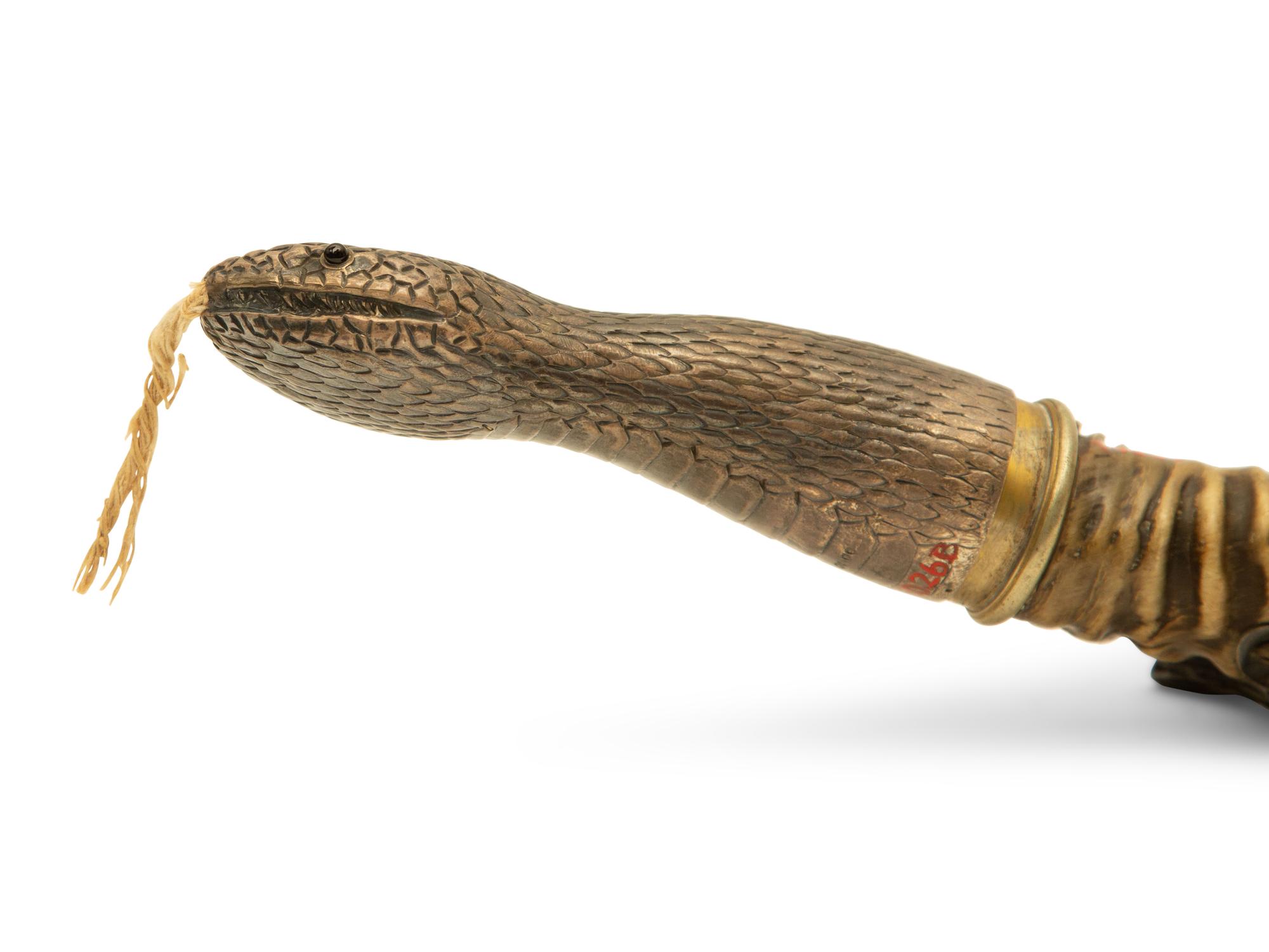 An English Silver Mounted Antelope Horn Snake-Form Cigar Lighter