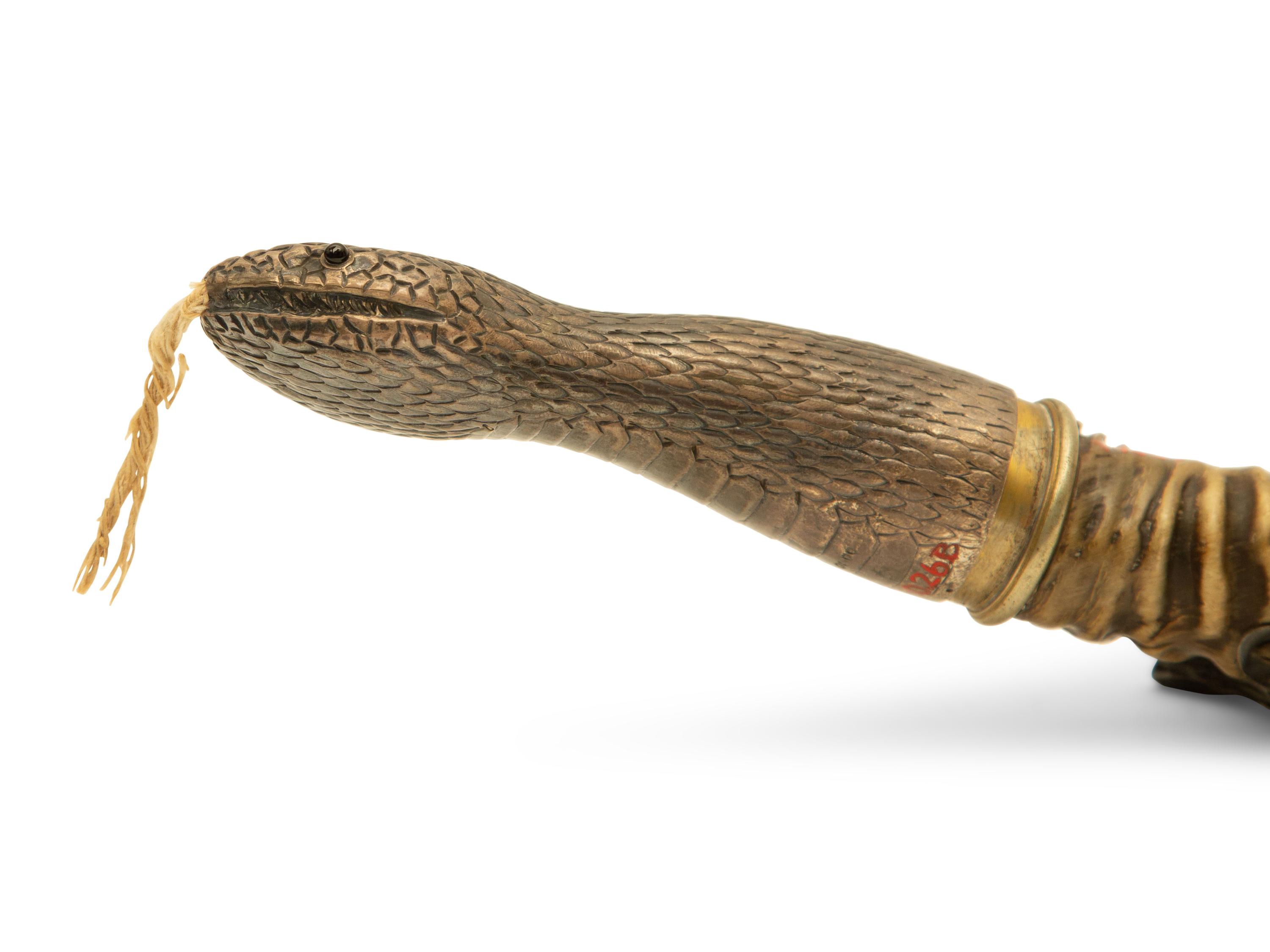 An English Silver Mounted Antelope Horn Snake-Form Cigar Lighter