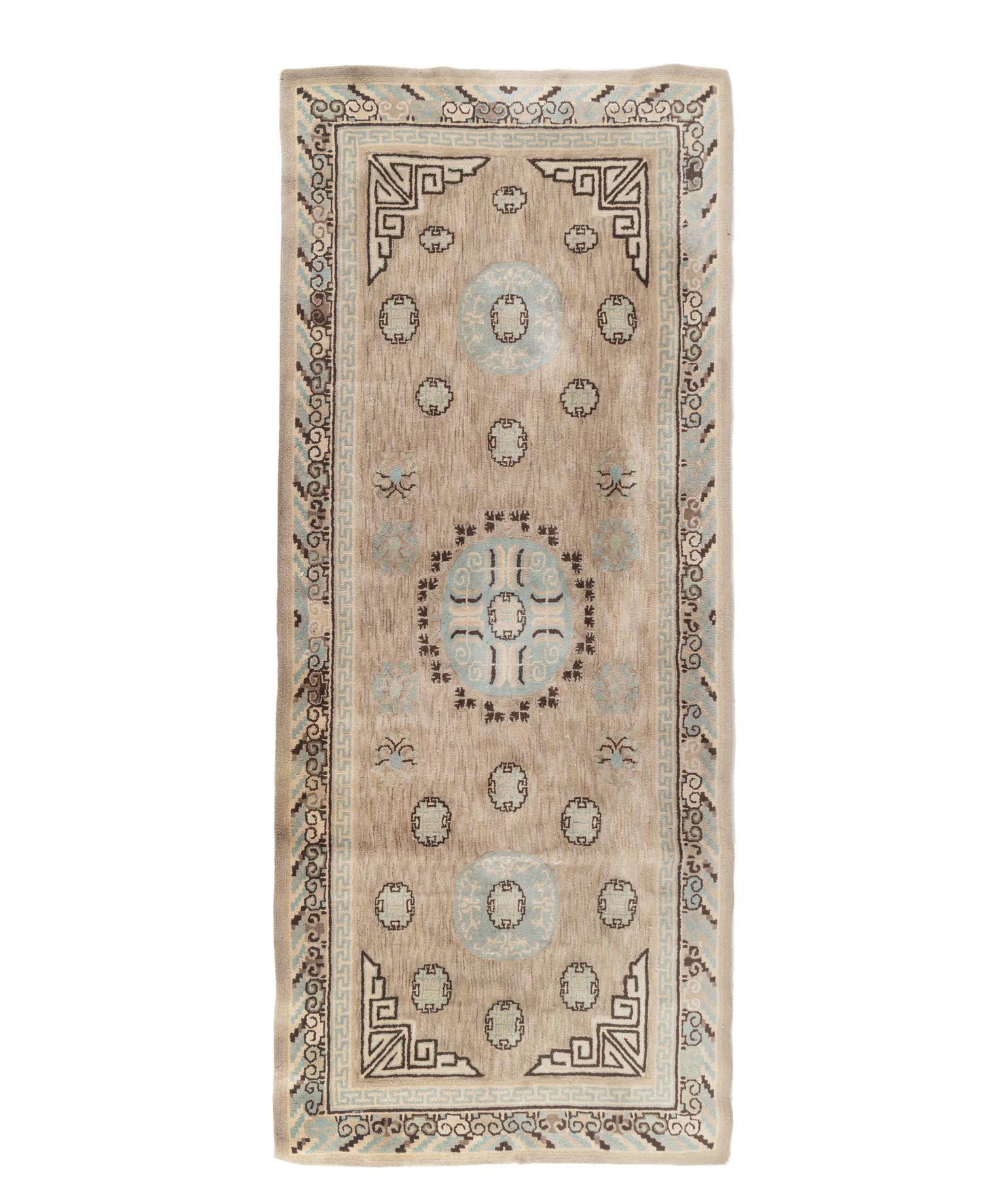 A Khotan Wool Rug and Another Rug