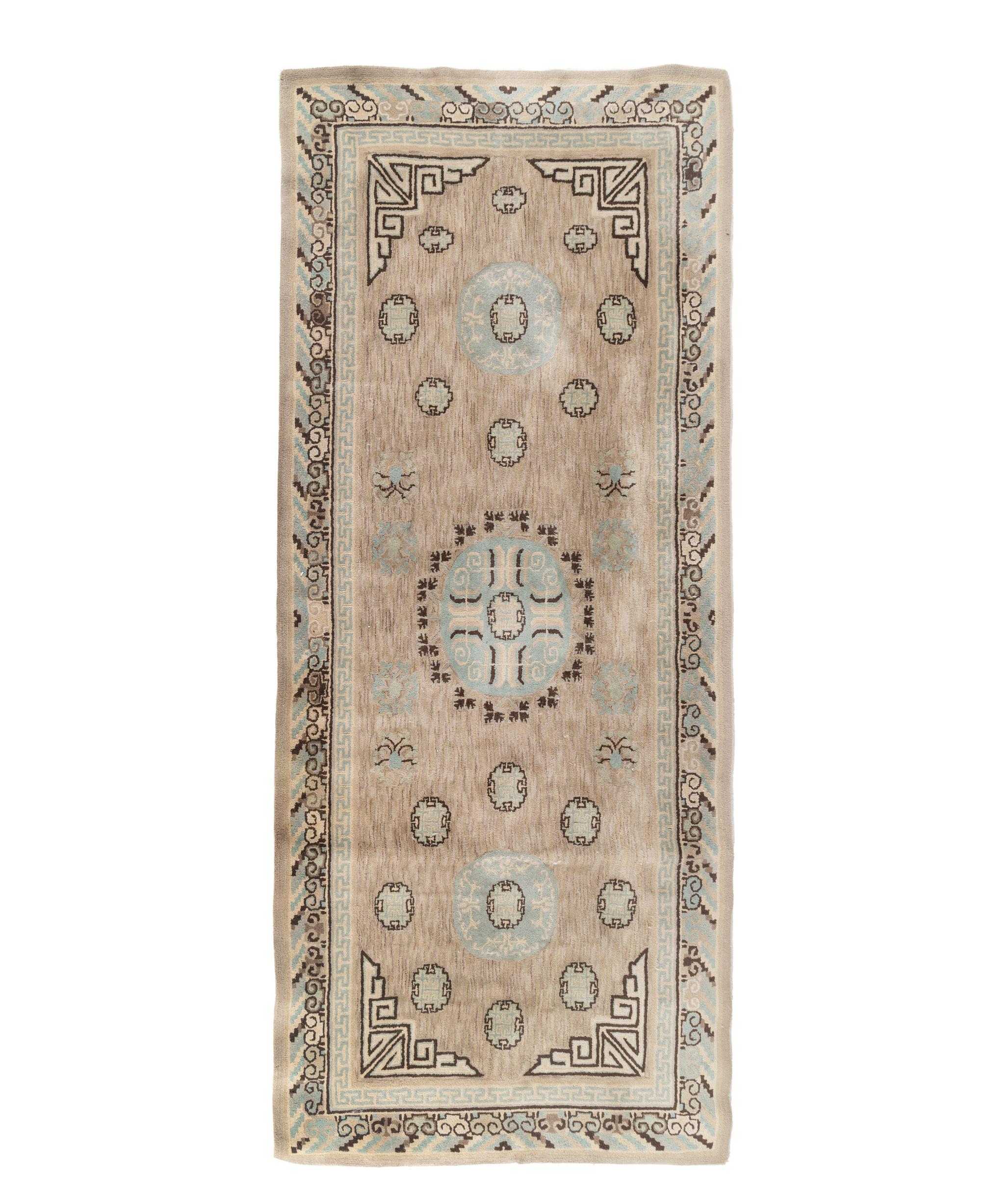 A Khotan Wool Rug and Another Rug