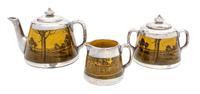 A Royal Doulton Silver Overlay Tea Service Height of teapot 5 inches.